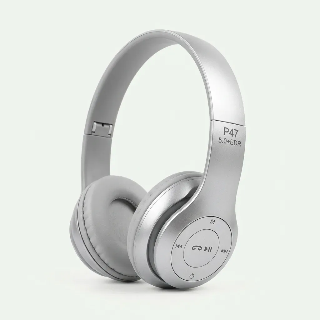 Silver P47 wireless headphones with light gray cushioned earcups, curved headband and circular playback controls on a white background.